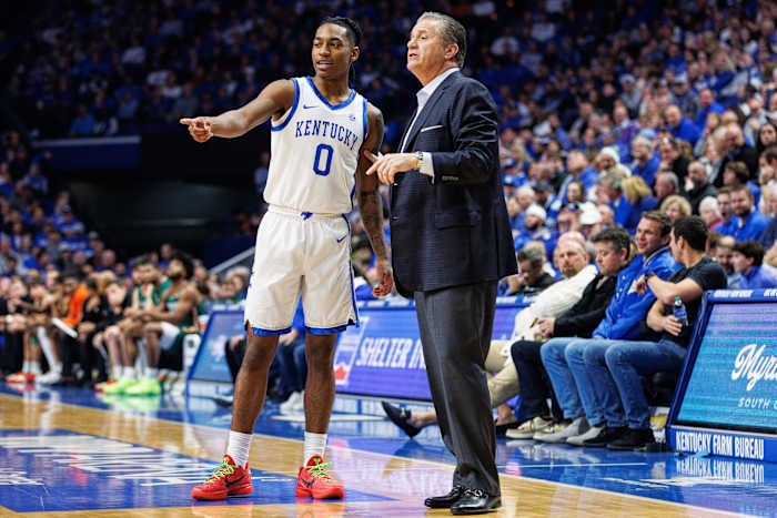 Nov 28, 2023; Lexington, Kentucky, USA; Kentucky Wildcats guard Rob Dillingham (0) talks with head coach John Calipari during the first half against the Miami (Fl) Hurricanes at Rupp Arena at Central Bank Center. Mandatory Credit: Jordan Prather-USA TODAY Sports